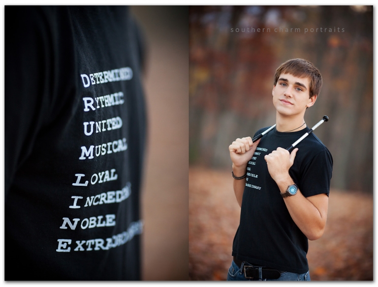 drumline t shirt and drumsticks in woods fall colors black shirt