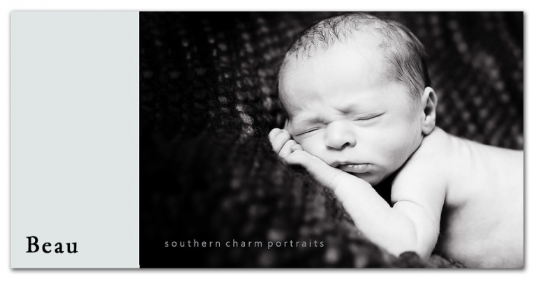 one of twins sleeping on blanket all squoosed up!