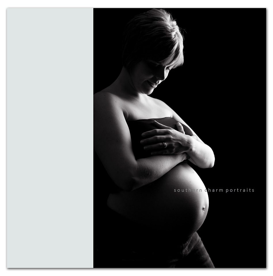 gorgeous pregant woman on black backdrop silloette