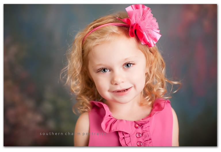 beautiful blue eyed Jenna with a bright pink hairbow