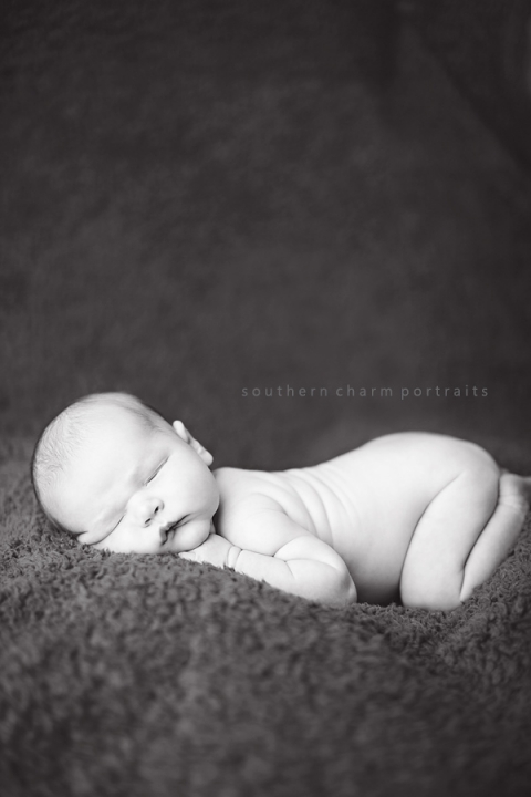 baby sleeping with fat rolls