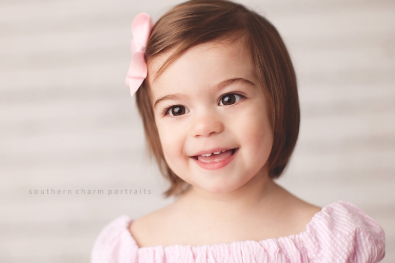 little girl with easter backdrop