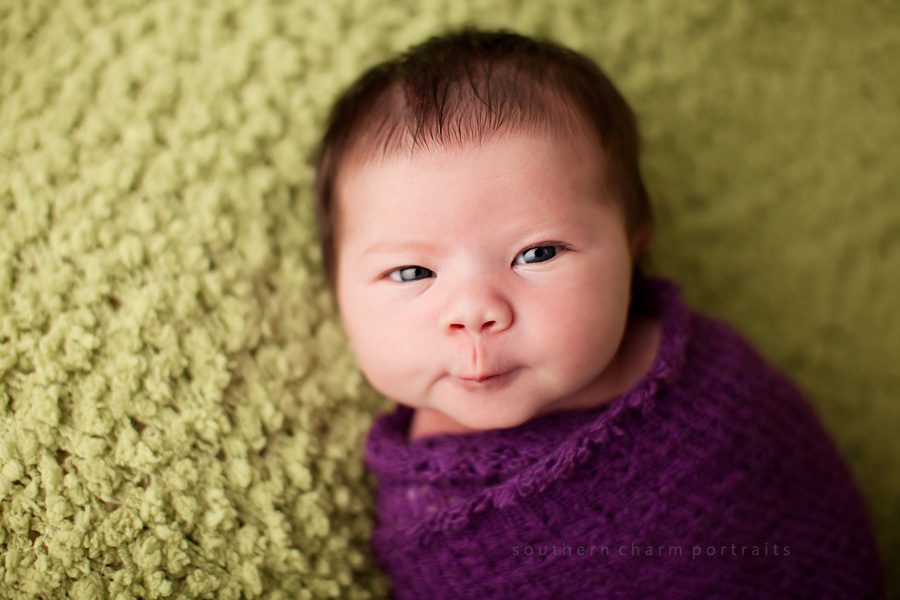 baby in wrap on beanbag