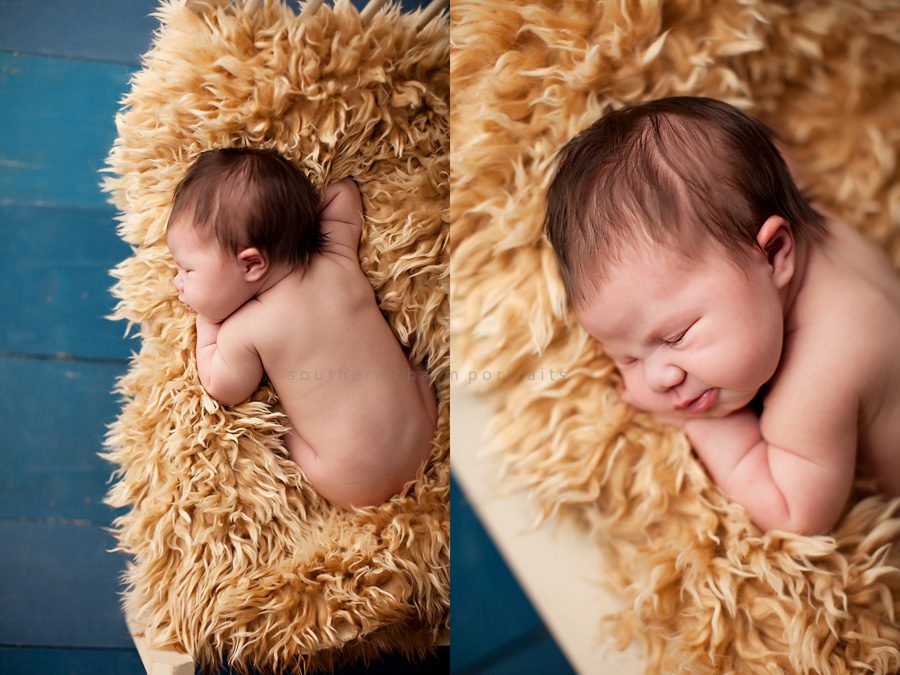 baby sleeping on bed