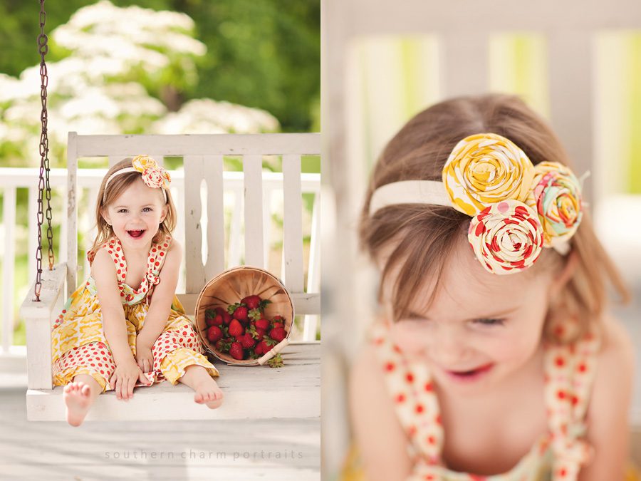 little girl with basket of strawberries