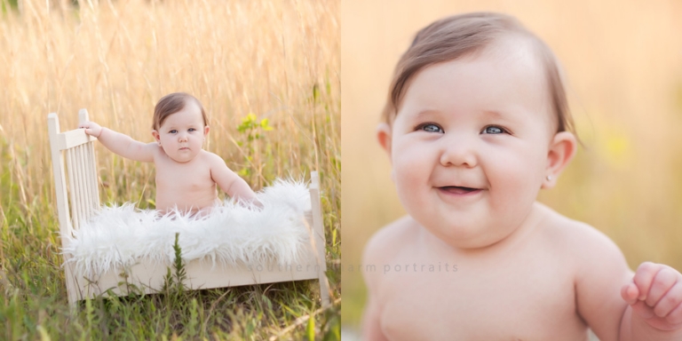 baby in miniature bed in field