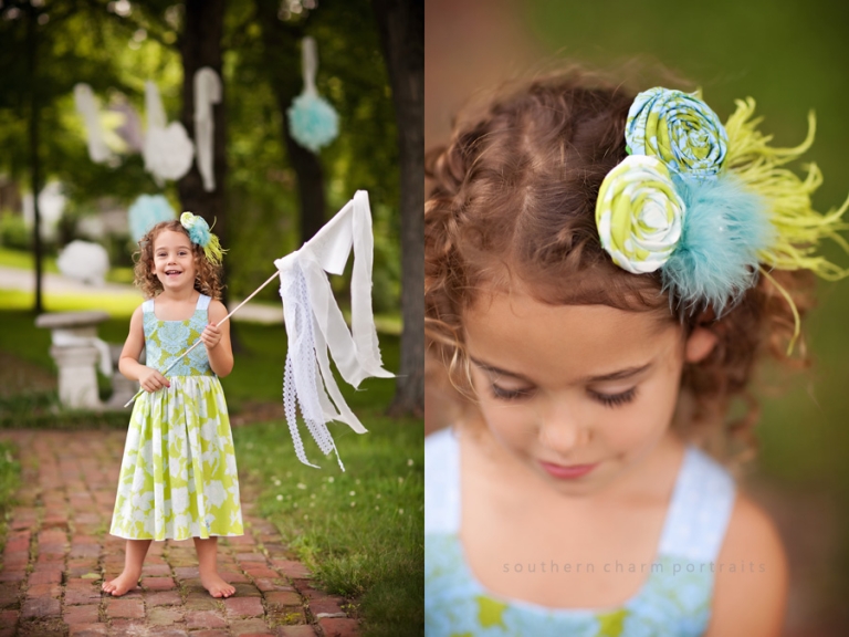 little girl in boutique clothing in outdoor garden